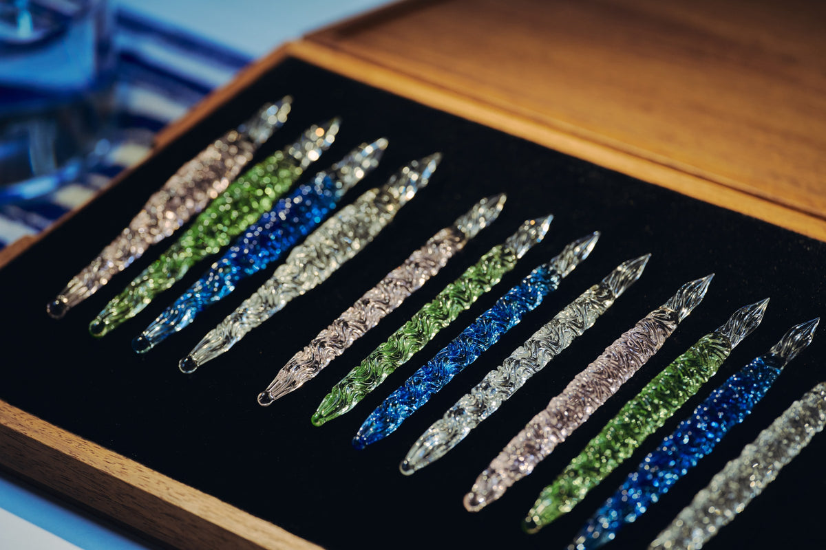 Hard glass pens by Kan Seifu in a wooden case